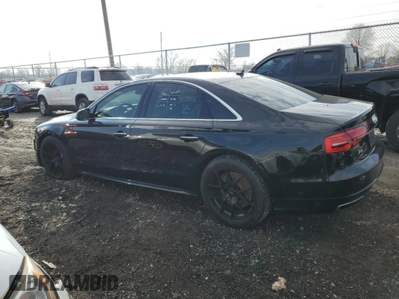 2016 Audi A8 with VIN WAUK3AFD8GN008759, listed as a Copart auction lot 81256324 with 86,244 mi miles and Salvage title. Bid and sale history available at DreamBid. Image 2.