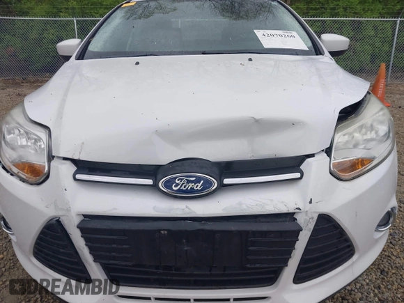 2012 Ford Focus SE with VIN 1FAHP3F21CL201889, listed as a IAAI auction lot 42070260 with 126,650 mi miles. Bid and sale history available at carsss.com. Image 6.