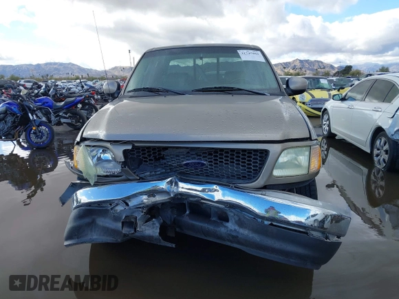 2003 Ford F-150 XLT with VIN 1FTRW07L53KD82167, listed as a IAAI auction lot 41745801 with 216,783 mi miles. Bid and sale history available at carsss.com. Image 12.