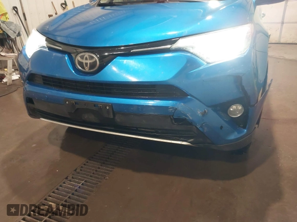 2016 Toyota RAV4 Limited with VIN JTMDFREV5GJ064094, listed as a IAAI auction lot 41862018 with 122,042 mi miles and . Bid and sale history available at DreamBid. Image 18.