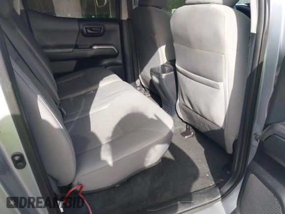 2018 Toyota Tacoma SR5 with VIN 5TFAZ5CN6JX057889, listed as a IAAI auction lot 41449604 with 114,888 mi miles and . Bid and sale history available at DreamBid. Image 8.