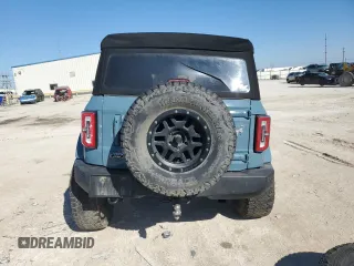 2022 Ford Bronco с VIN 1FMEE5BPXNLB48768, выставлен на аукционе Copart как лот 43203625 с пробегом 75 873 миль миль и Списание • Salvage title. История ставок и продаж доступна на DreamBid. Изображение 6.