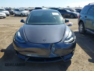 2021 Tesla Model 3 Long Range with VIN 5YJ3E1EB9MF997442, listed as a IAAI auction lot 41759875 with 87,059 mi miles. Bid and sale history available at carsss.com. Image 11.