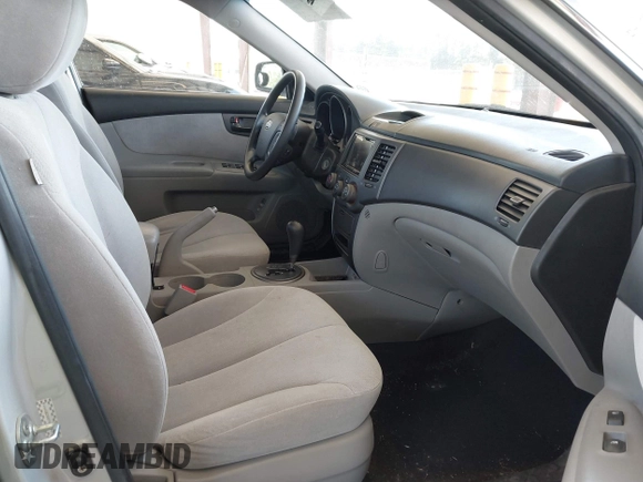 2009 Kia Optima LX z VIN KNAGE228795357008, wystawiony jako IAAI lot #42228948 z przebiegiem 148 194 mil mil oraz . Historia ofert i sprzedaży dostępna na DreamBid. Obrazek 5.