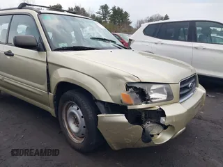 2003 Subaru Forester XS with VIN JF1SG65683H734188, listed as a IAAI auction lot 41584619 with 242,536 mi miles. Bid and sale history available at carsss.com. Image 6.
