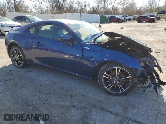 2014 Scion FR-S with VIN JF1ZNAA14E8700043, listed as a Copart auction lot 49283575 with 107,319 mi miles and Salvage Title. Bid and sale history available at DreamBid. Image 4.