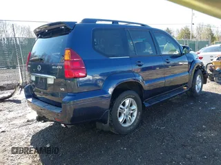 2005 Lexus GX with VIN JTJBT20XX50081621, listed as a IAAI auction lot 41661384 with 208,071 mi miles. Bid and sale history available at carsss.com. Image 4.