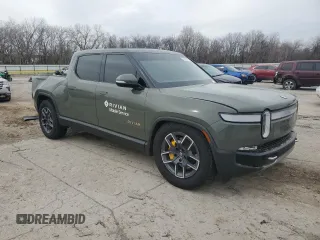 2022 Rivian R1T Launch Edition z VIN 7FCTGAAL2NN000433, wystawiony jako Copart lot #46680705 z przebiegiem Nie podano mil oraz Szkody całkowita. Historia ofert i sprzedaży dostępna na DreamBid. Obrazek 4.