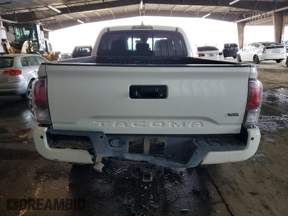 2021 Toyota Tacoma 4WD SR5 with VIN 3TMDZ5BN4MM106693, listed as a Copart auction lot 45278655 with 52,510 mi miles and Salvage Title. Bid and sale history available at carsss.com. Image 6.