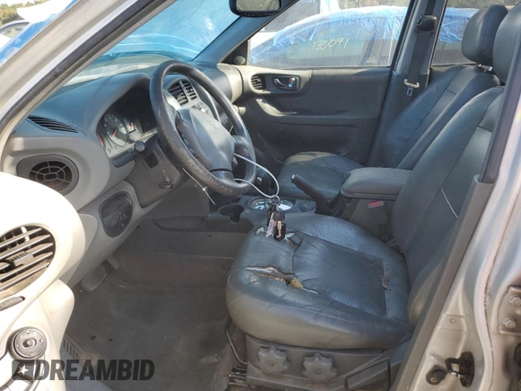 2003 Hyundai Santa Fe GLS with VIN KM8SC13E93U521854, listed as a Copart auction lot 74481814 with 242,069 mi miles and Salvage Title. Bid and sale history available at carsss.com. Image 7.