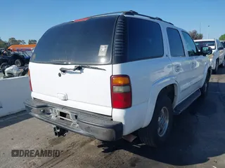 2002 Chevrolet Tahoe LS z VIN 1GNEC13TX2R240719, wystawiony jako IAAI lot #41616356 z przebiegiem 235 081 mil mil oraz . Historia ofert i sprzedaży dostępna na DreamBid. Obrazek 4.