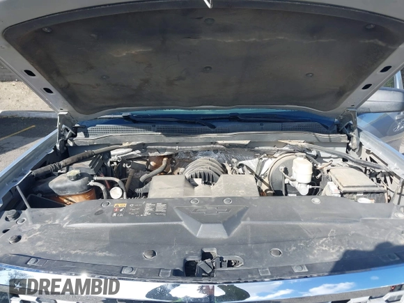 2014 Chevrolet Silverado 1500 with VIN 1GCNCREH2EZ303297, listed as a IAAI auction lot 41692877 with 115,621 mi miles and . Bid and sale history available at DreamBid. Image 10.