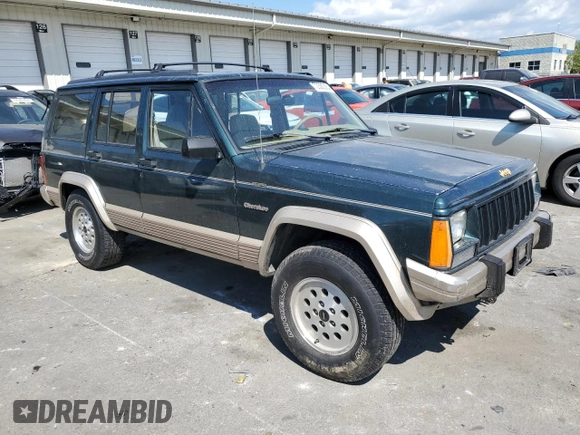 1993 Jeep Cherokee Country with VIN 1J4FJ78S4PL517648, listed as a Copart auction lot 72383564 with 127,156 mi miles and Salvage Title. Bid and sale history available at carsss.com. Image 4.