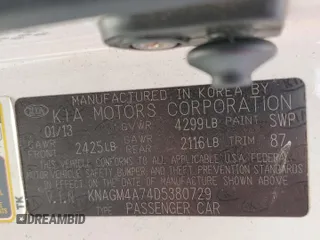 2013 Kia Optima LX z VIN KNAGM4A74D5380729, wystawiony jako Copart lot #56555835 z przebiegiem 126 904 mil mil oraz Szkoda całkowita • Salvage title. Historia ofert i sprzedaży dostępna na DreamBid. Obrazek 13.
