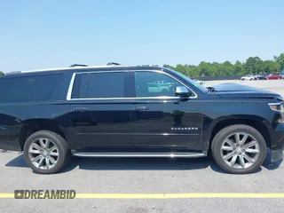 2019 Chevrolet Suburban LT with VIN 1GNSCJKC5KR304766, listed as a IAAI auction lot 42410264 with 105,171 mi miles and . Bid and sale history available at DreamBid. Image 13.