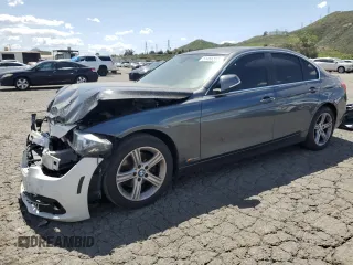 2015 BMW 3 Series 328i with VIN WBA3C1C50FK117993, listed as a Copart auction lot 51466895 with 128,426 mi miles and Clean title. Bid and sale history available at DreamBid. Image 1.