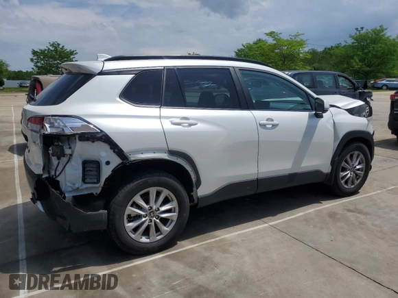 2023 Toyota Corolla Cross LE with VIN 7MUCAAAG2PV053730, listed as a Copart auction lot 54825035 with 33,313 mi miles and Salvage title. Bid and sale history available at DreamBid. Image 3.