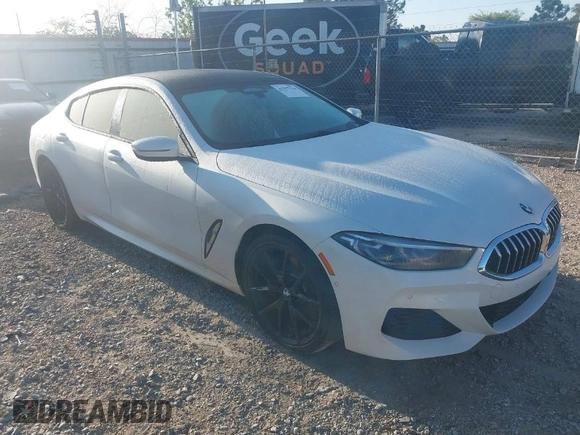2022 BMW 8 Series 840i with VIN WBAGV2C01NCJ90613, listed as a IAAI auction lot 41997214 with 28,014 mi miles. Bid and sale history available at carsss.com. Image 1.