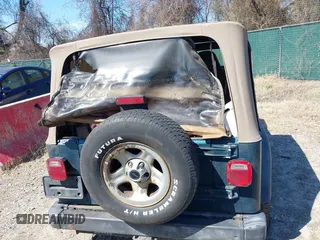 1997 Jeep Wrangler Sport with VIN 1J4FY19S1VP426589, listed as a IAAI auction lot 41865628 with 171,770 mi miles. Bid and sale history available at carsss.com. Image 6.