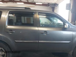 2010 Honda Pilot Touring with VIN 5FNYF4H89AB026005, listed as a IAAI auction lot 42118607 with 182,689 mi miles. Bid and sale history available at carsss.com. Image 13.