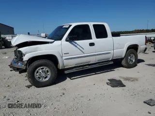 2006 GMC Sierra 2500HD SLT z VIN 1GTHK29D36E273167, wystawiony jako Copart lot #77560954 z przebiegiem 215 569 mil mil oraz Szkoda całkowita • Salvage title. Historia ofert i sprzedaży dostępna na DreamBid. Obrazek 1.
