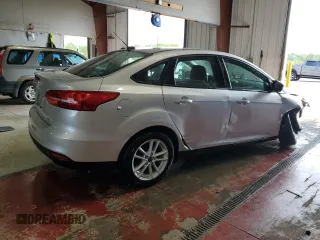 2018 Ford Focus SE with VIN 1FADP3F23JL214008, listed as a Copart auction lot 59692045 with 57,247 mi miles and Salvage title. Bid and sale history available at DreamBid. Image 3.