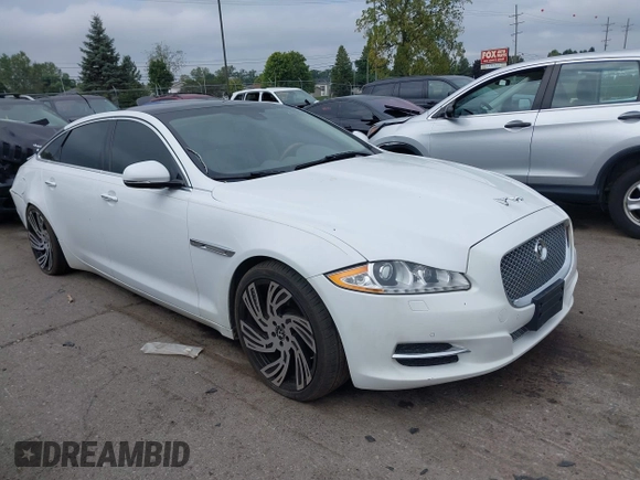 2013 Jaguar XJ Portfolio with VIN SAJWJ2GD3D8V48238, listed as a IAAI auction lot 40435160 with 136,738 mi miles and . Bid and sale history available at DreamBid. Image 1.