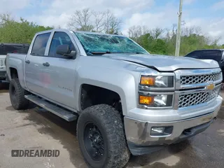 2014 Chevrolet Silverado 1500 LT with VIN 3GCUKREC3EG456385, listed as a IAAI auction lot 41931312 with 62,616 mi miles and . Bid and sale history available at DreamBid. Image 1.