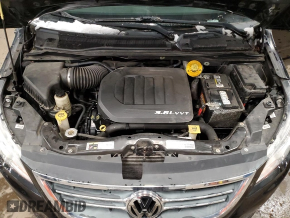 2014 Volkswagen Routan SE with VIN 2C4RVABG5ER135352, listed as a Copart auction lot 51677515 with 136,833 mi miles and Clean title. Bid and sale history available at DreamBid. Image 12.