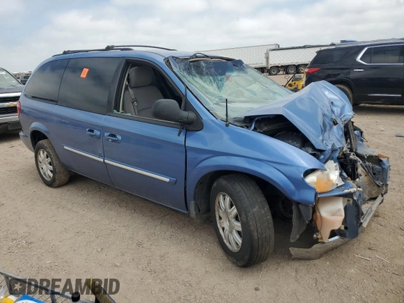 2007 Chrysler Town & Country Touring z VIN 2A4GP54L27R183214, wystawiony jako Copart lot #53818285 z przebiegiem Nie podano mil oraz Szkoda całkowita • Salvage title. Historia ofert i sprzedaży dostępna na DreamBid. Obrazek 4.