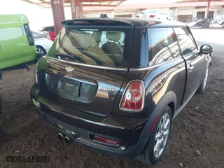 2013 MINI Cooper Hardtop S with VIN WMWSV3C5XDT480004, listed as a IAAI auction lot 41885248 with 148,419 mi miles. Bid and sale history available at carsss.com. Image 4.