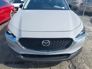2025 Mazda CX-30 S Select Sport z VIN 3MVDMBBM8SM758071, wystawiony jako IAAI lot #42007849 z przebiegiem 8 678 mil mil oraz . Historia ofert i sprzedaży dostępna na DreamBid. Obrazek 12.