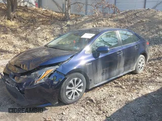 2021 Toyota Corolla Hybrid LE with VIN JTDEAMDEXMJ018053, listed as a IAAI auction lot 41779462 with 60,794 mi miles. Bid and sale history available at carsss.com. Image 23.