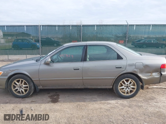 2001 Toyota Camry LE z VIN 4T1BF28K81U116710, wystawiony jako IAAI lot #41923429 z przebiegiem 145 741 mil mil oraz . Historia ofert i sprzedaży dostępna na DreamBid. Obrazek 13.