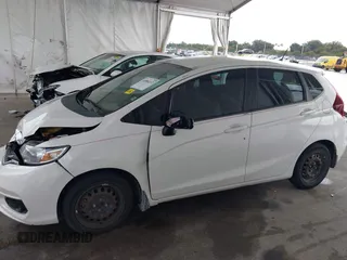 2018 Honda Fit LX with VIN 3HGGK5H49JM734620, listed as a IAAI auction lot 41984212 with 106,427 mi miles. Bid and sale history available at carsss.com. Image 15.