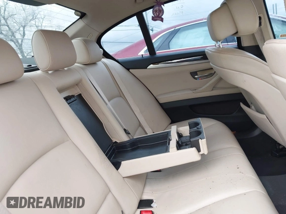 2012 BMW 5 Series 528i with VIN WBAXG5C5XCDX01864, listed as a IAAI auction lot 41910337 with 200,110 mi miles. Bid and sale history available at carsss.com. Image 8.