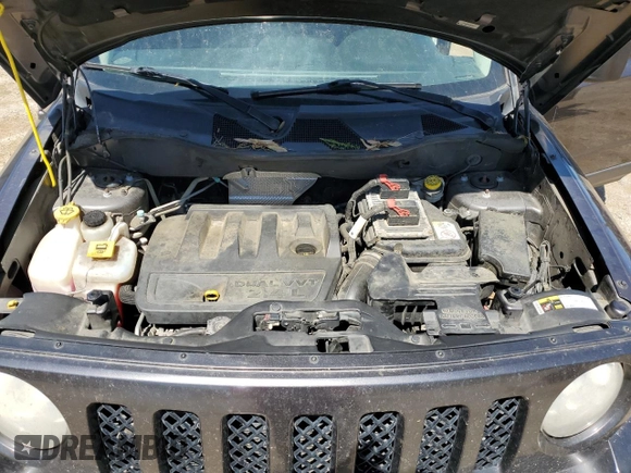 2014 Jeep Patriot Latitude z VIN 1C4NJRFB6ED817392, wystawiony jako Copart lot #52930055 z przebiegiem 126 813 mil mil oraz Szkoda całkowita • Salvage title. Historia ofert i sprzedaży dostępna na DreamBid. Obrazek 13.
