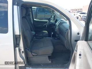 2013 Nissan Frontier SV with VIN 1N6AD0CUXDN763835, listed as a IAAI auction lot 42519926 with 208,577 mi miles and . Bid and sale history available at DreamBid. Image 5.