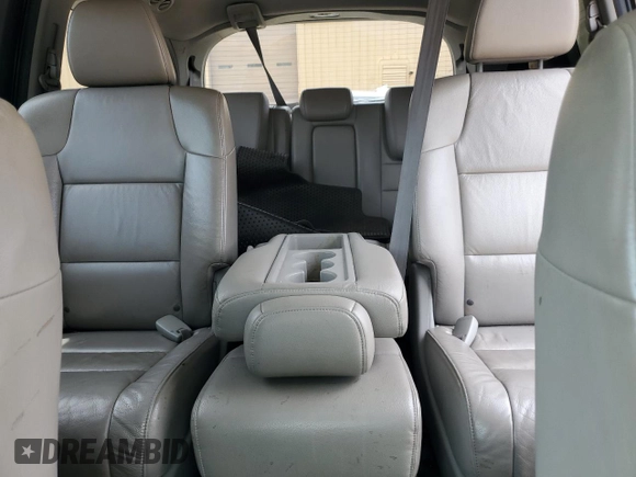 2012 Honda Odyssey Touring with VIN 5FNRL5H90CB050580, listed as a Copart auction lot 58502925 with 226,929 mi miles and Salvage title. Bid and sale history available at DreamBid. Image 10.