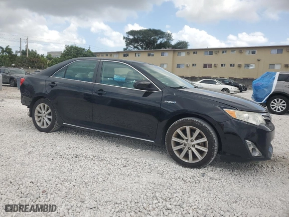 2012 Toyota Camry Hybrid XLE with VIN 4T1BD1FK8CU060564, listed as a Copart auction lot 51137405 with 185,072 mi miles and Salvage Title. Bid and sale history available at carsss.com. Image 4.
