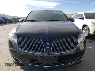 2015 Lincoln MKT with VIN 2LMHJ5NK0FBL03357, listed as a Copart auction lot 87189024 with 228,046 mi miles and Salvage Title. Bid and sale history available at carsss.com. Image 5.