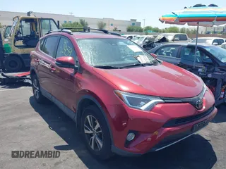 2018 Toyota RAV4 XLE with VIN 2T3WFREV4JW505053, listed as a IAAI auction lot 42552459 with 94,552 mi miles and . Bid and sale history available at DreamBid. Image 1.