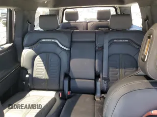 2024 Rivian R1S Adventure z VIN 7PDSGABA7RN034025, wystawiony jako Copart lot #49332795 z przebiegiem Nie podano mil oraz Szkody całkowita. Historia ofert i sprzedaży dostępna na DreamBid. Obrazek 10.