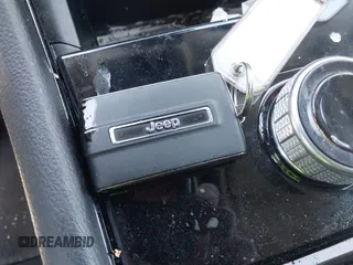 2023 Jeep Grand Cherokee Laredo with VIN 1C4RJKAG4P8884547, listed as a IAAI auction lot 41987068 with 46,879 mi miles and . Bid and sale history available at DreamBid. Image 11.