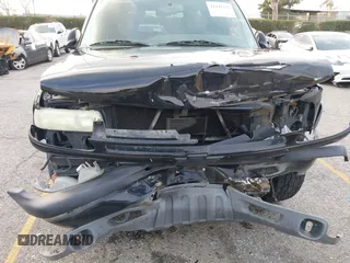 2004 Chevrolet Tahoe LS with VIN 1GNEK13T64R265302, listed as a IAAI auction lot 41445237 with 242,840 mi miles. Bid and sale history available at carsss.com. Image 6.