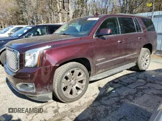 2017 GMC Yukon Denali with VIN 1GKS2CKJ5HR229277, listed as a Copart auction lot 87868105 with 95,714 mi miles and Salvage Title. Bid and sale history available at carsss.com. Image 1.