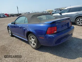 2004 Ford Mustang Deluxe with VIN 1FAFP44454F126387, listed as a IAAI auction lot 41948123 with 114,686 mi miles. Bid and sale history available at carsss.com. Image 3.