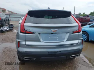 2025 Cadillac XT4 FWD Premium Luxury z VIN 1GYFZCR44SF122443, wystawiony jako IAAI lot #42414279 z przebiegiem 11 023 mil mil oraz . Historia ofert i sprzedaży dostępna na DreamBid. Obrazek 16.