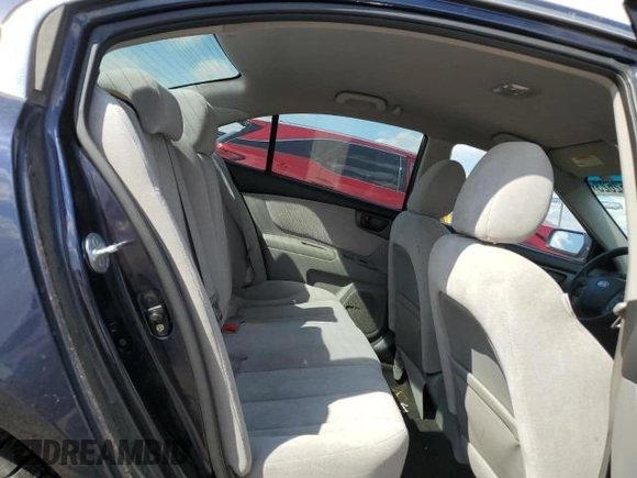 2010 Kia Optima LX z VIN KNAGG4A86A5426444, wystawiony jako Copart lot #61498275 z przebiegiem 166 526 mil mil oraz Czysty tytuł • Clean title. Historia ofert i sprzedaży dostępna na DreamBid. Obrazek 10.