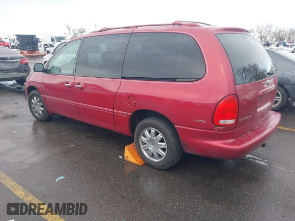 1999 Chrysler Town & Country with VIN 1C4GT64L7XB723937, listed as a IAAI auction lot 41609957 with 242,800 mi miles and . Bid and sale history available at DreamBid. Image 3.